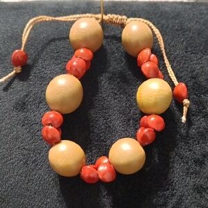 Adjustable Natural Wood Bracelet with Red Accent Beads